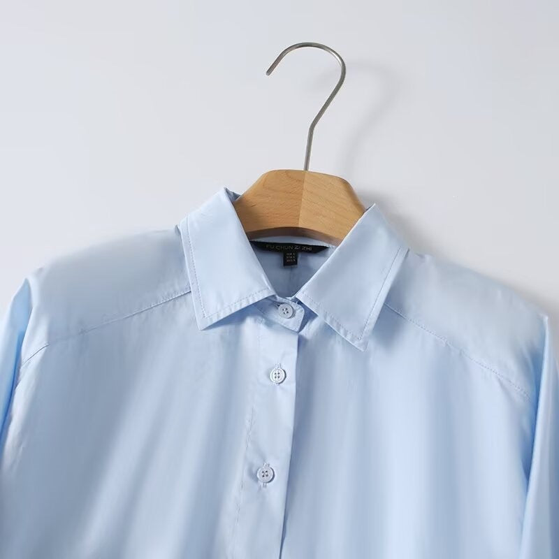Dame elegant langermet bluse med moderne detaljer og strukturert stoff Skjora