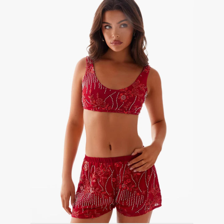Kvinne bikini sett med glitrende blomsterdetaljer og kroppsnær passform