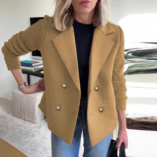 Kvinnenes elegante oversized blazer med dobbelt knappestolpe og teksturert erme Skjora
