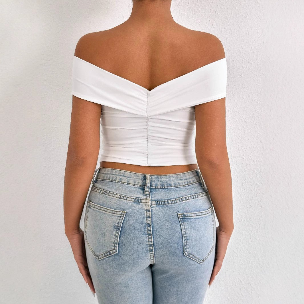 Dame off-shoulder topp med elegant drapering Skjora
