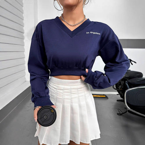 Kvinnens casual V-hals crop topp med elastisk kant og lange ermer Skjora