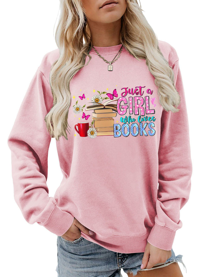 Dame sweatshirt med iøynefallende bokmotiv og ledig passform Skjora