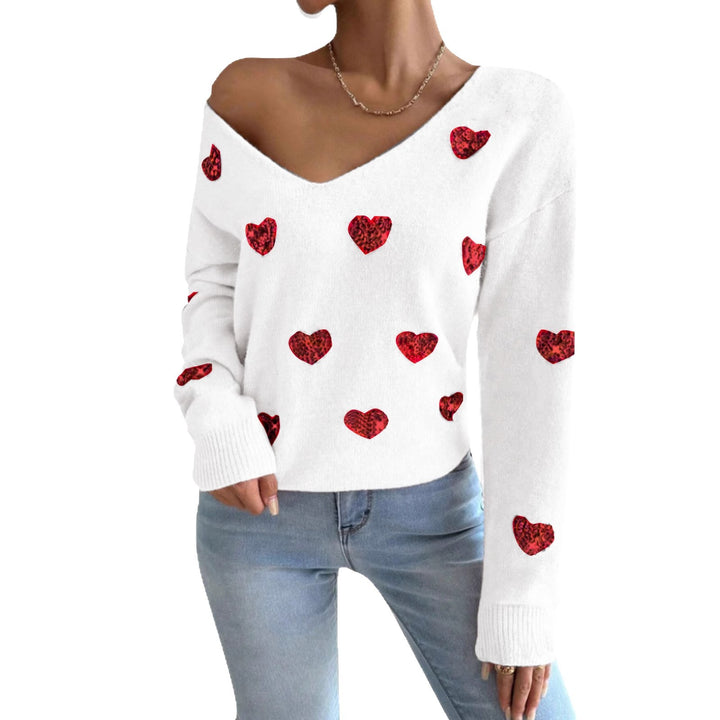 Kvinnelig oversized genser med dyp V-hals og hjerte motiver Skjora