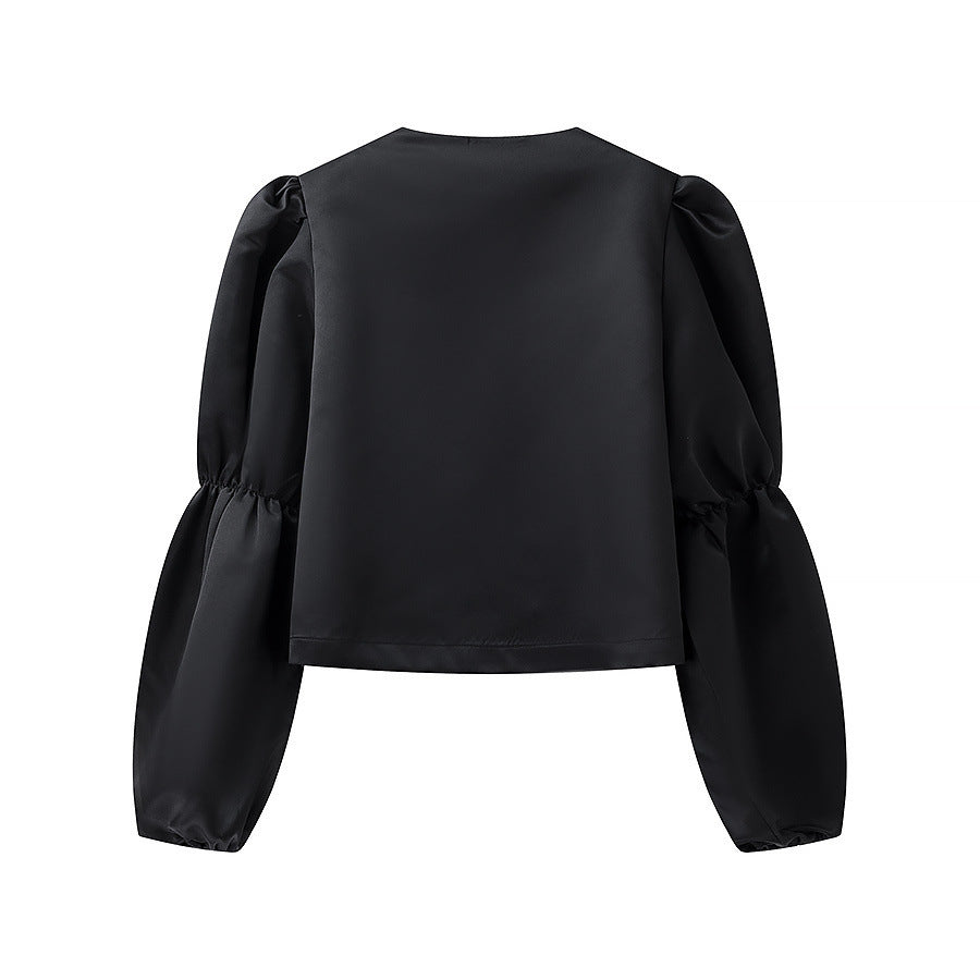 Kvinnens elegant skreddersydde bluse med voluminøse ermer Skjora