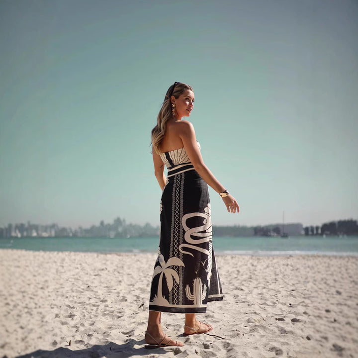 Kvinne bandeau maxi kjole med elegant bladmønster og høy benfrihet