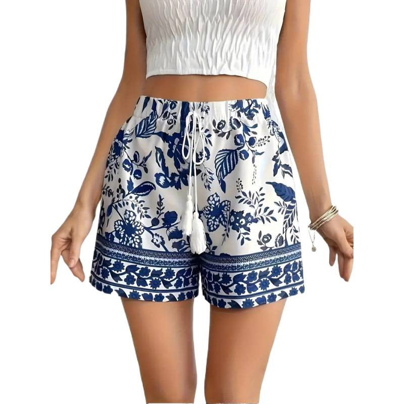 Dame fritidsshortser med blomstermønster og elastisk midje Skjora