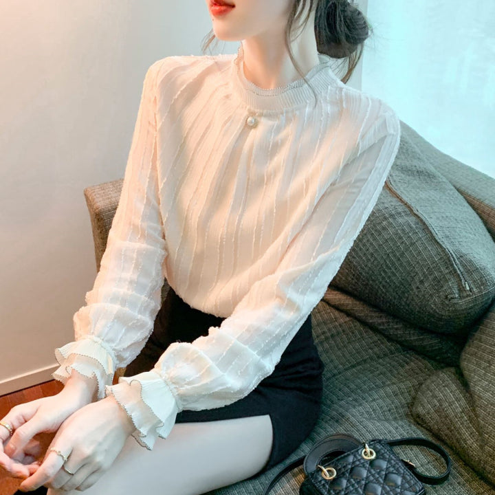 Damer elegant bluse med teksturdesign og volangkant Skjora
