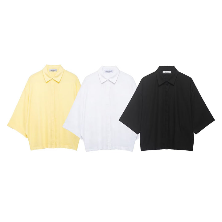Dame oversized-bluse med moderne snitt og praktiske knappdetaljer Skjora