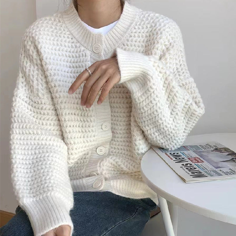 Kvinnes chunky strikket cardigan med dekorative knapper og avslappet snitt Skjora