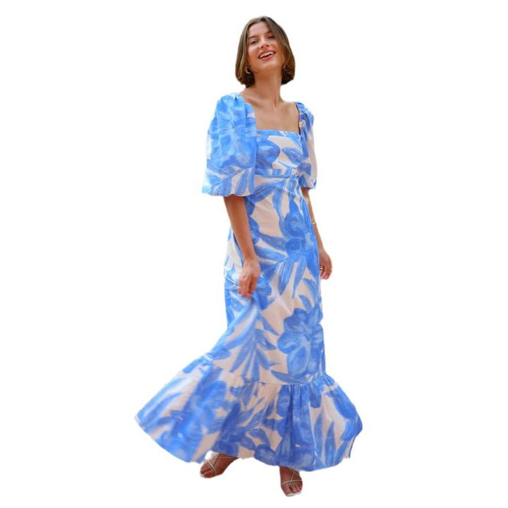 Dame maxi kjole med elegante pufferm og blomsterdetaljer Skjora