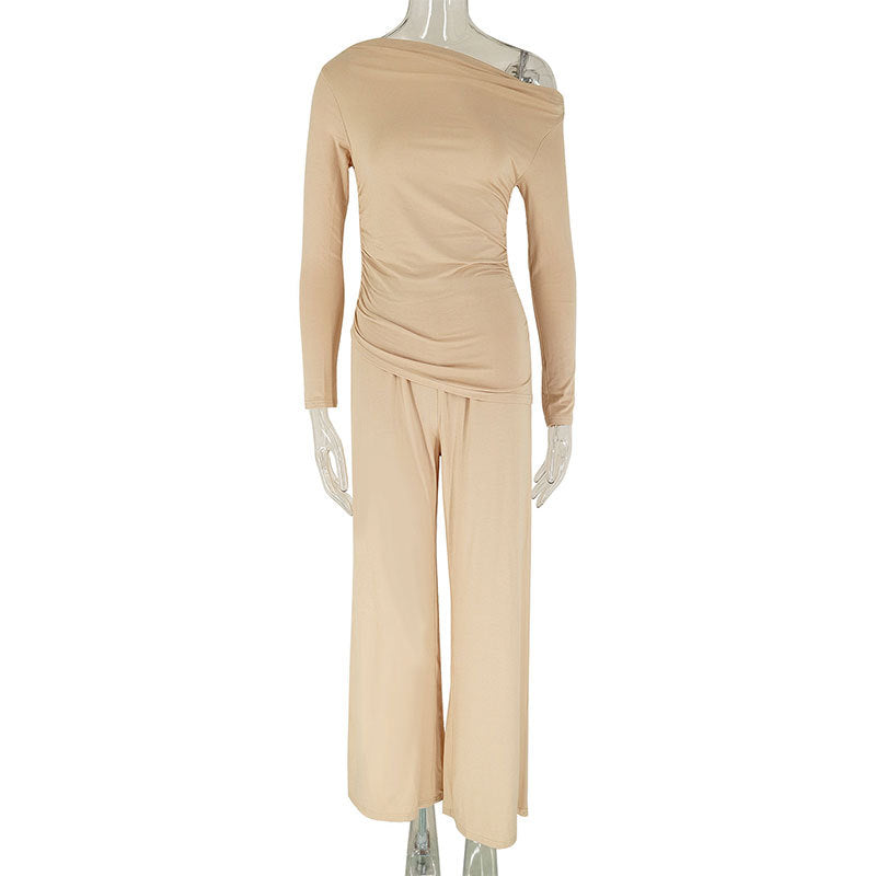 Dame elegant to-delt sett i flytende materiale med asymmetrisk design Skjora