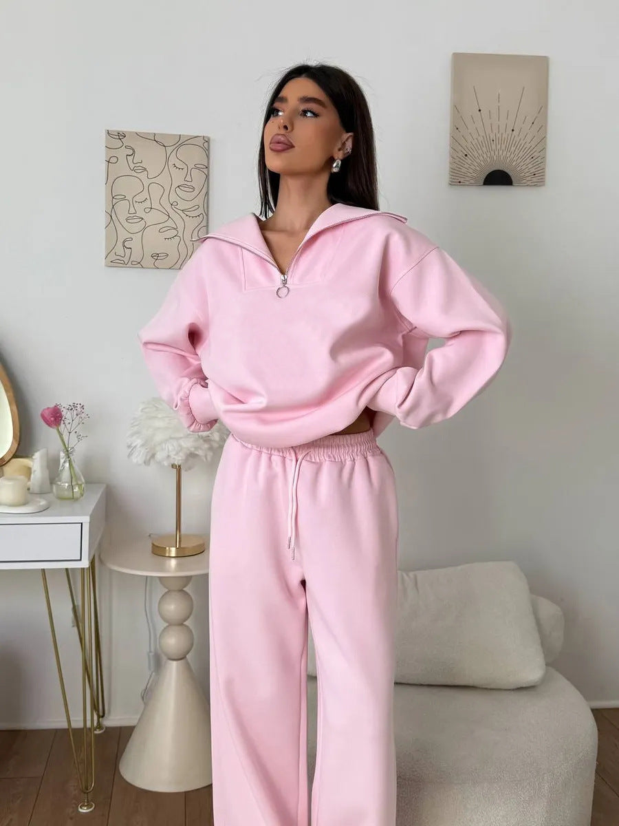 Kvinnens elegante fleece treningsoverall med høy krage og praktisk glidelås