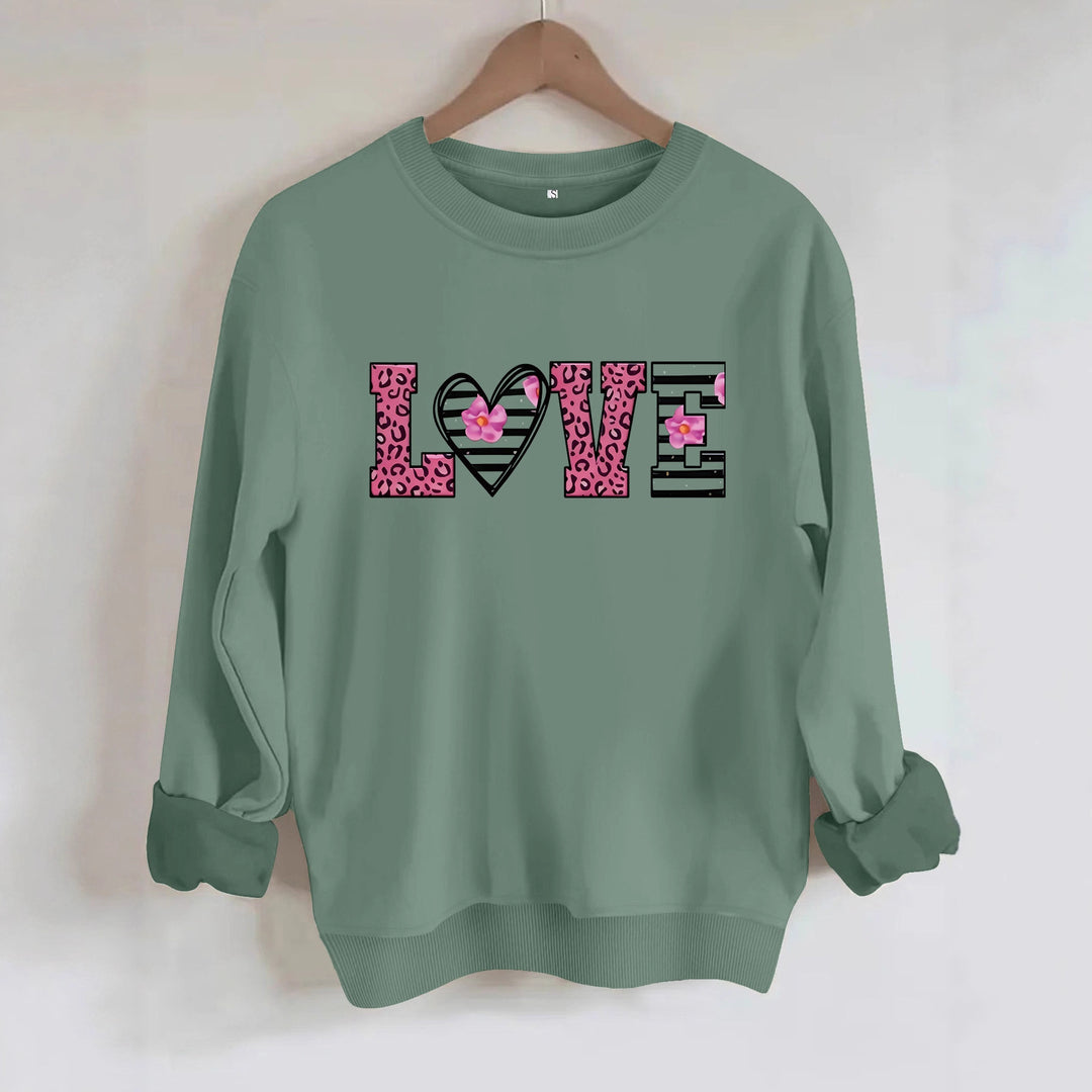 Dame sweatshirt med moderne leopard hjerte-design og behagelig passform Skjora