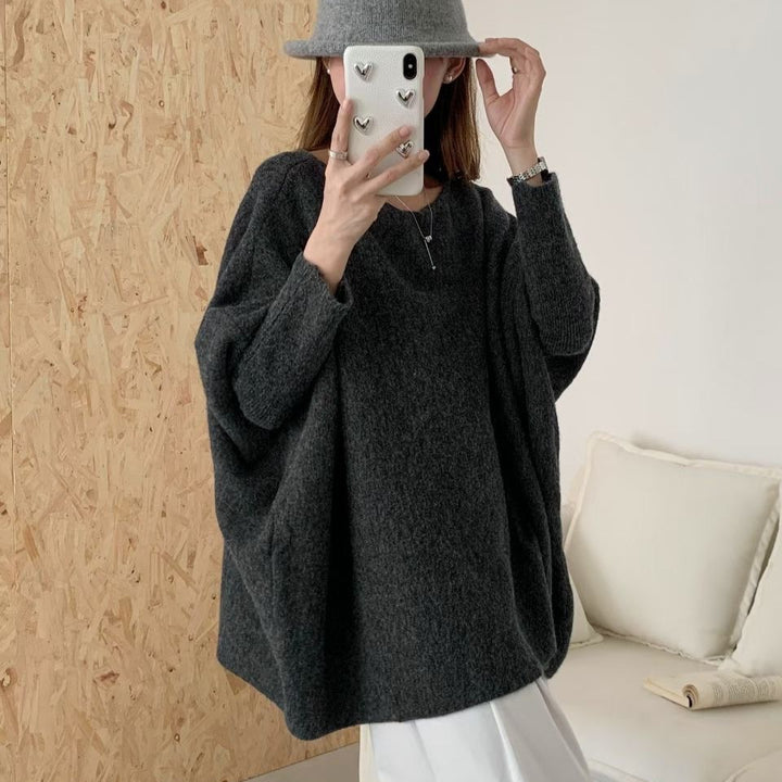 Dame oversized strikkegenser med en avslappet fasong og dramatiske ermer Skjora