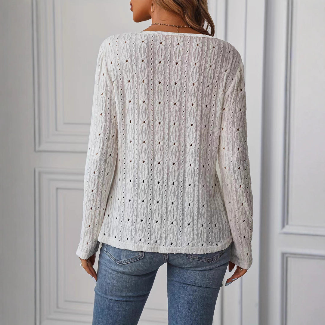 Women's long-sleeved shirt with decorative buttons and textured weave
