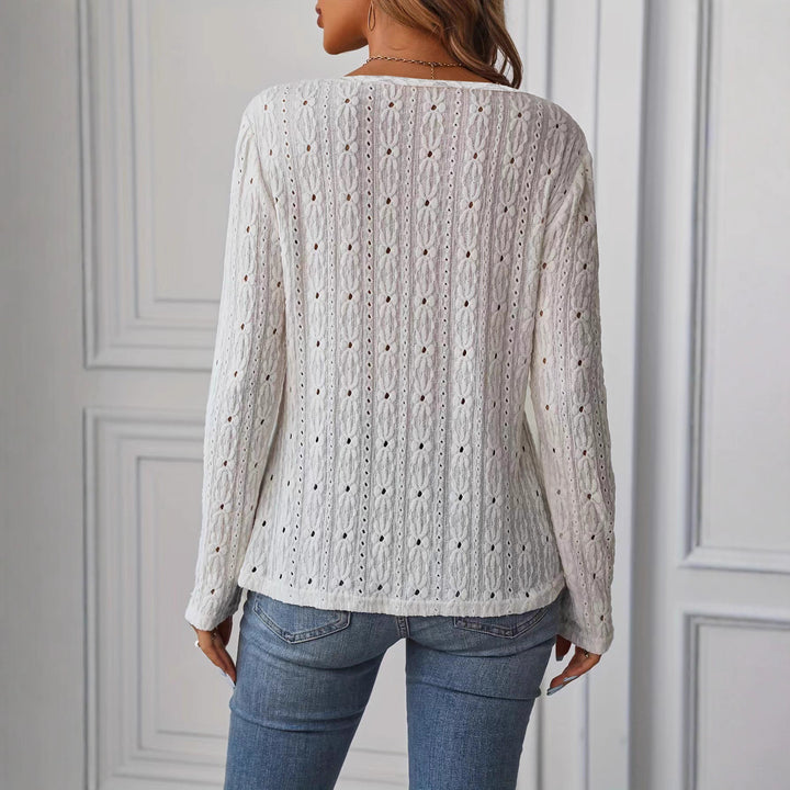 Women's long-sleeved shirt with decorative buttons and textured weave