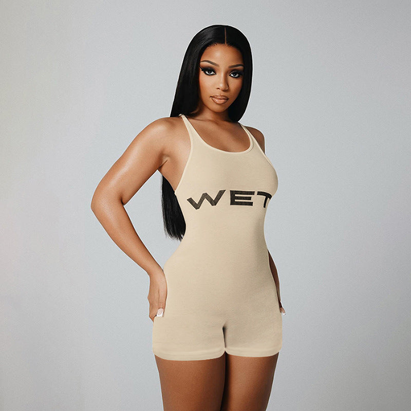 Dame Sporty jumpsuit med racerback og iøynefallende logo Skjora