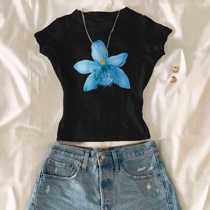 Dame Crop-T-skjorte med blomstertrykk og avslappet snitt Skjora