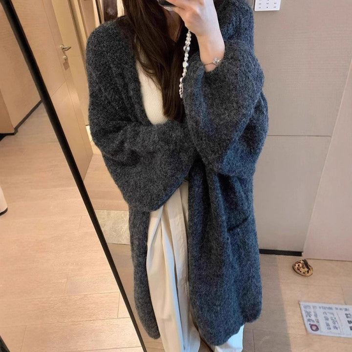 Kvinners fluffy cardigan med store lommer og løs passform Skjora