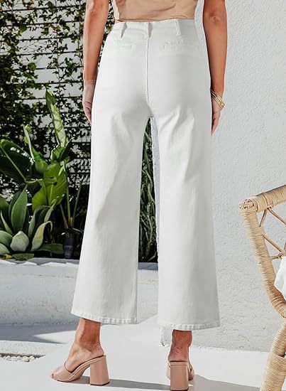 Damer høyhalsa jeans med knapppreget og vid ben Skjora
