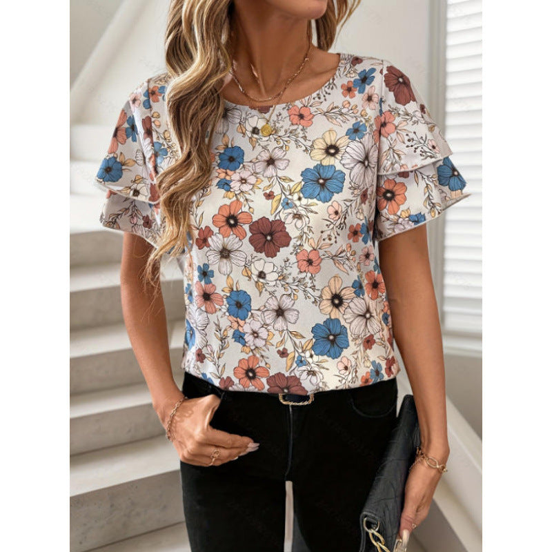 Damer kortermet bluse med volang og blomsterdesign Skjora