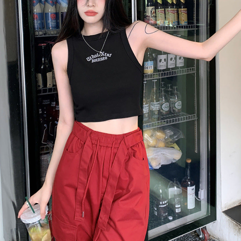 Kvinne Crop Top med Høy Krage og Diskret Logo Skjora