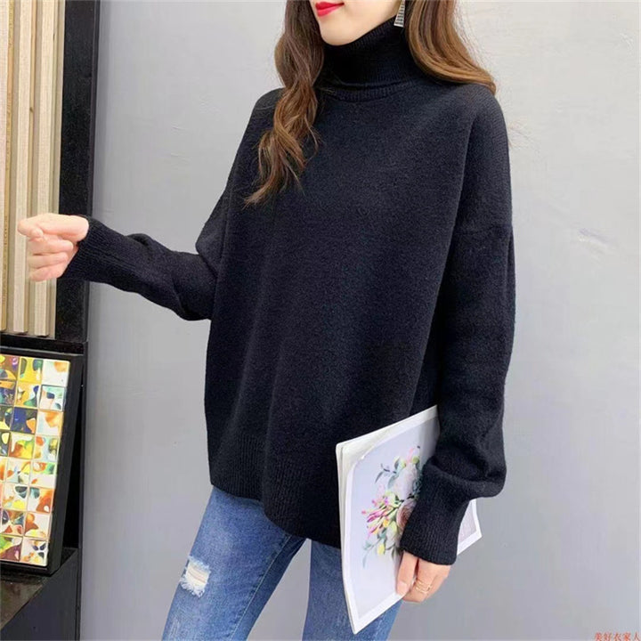 Kvinnens chunky strikkegenser med høy hals og oversized passform Skjora