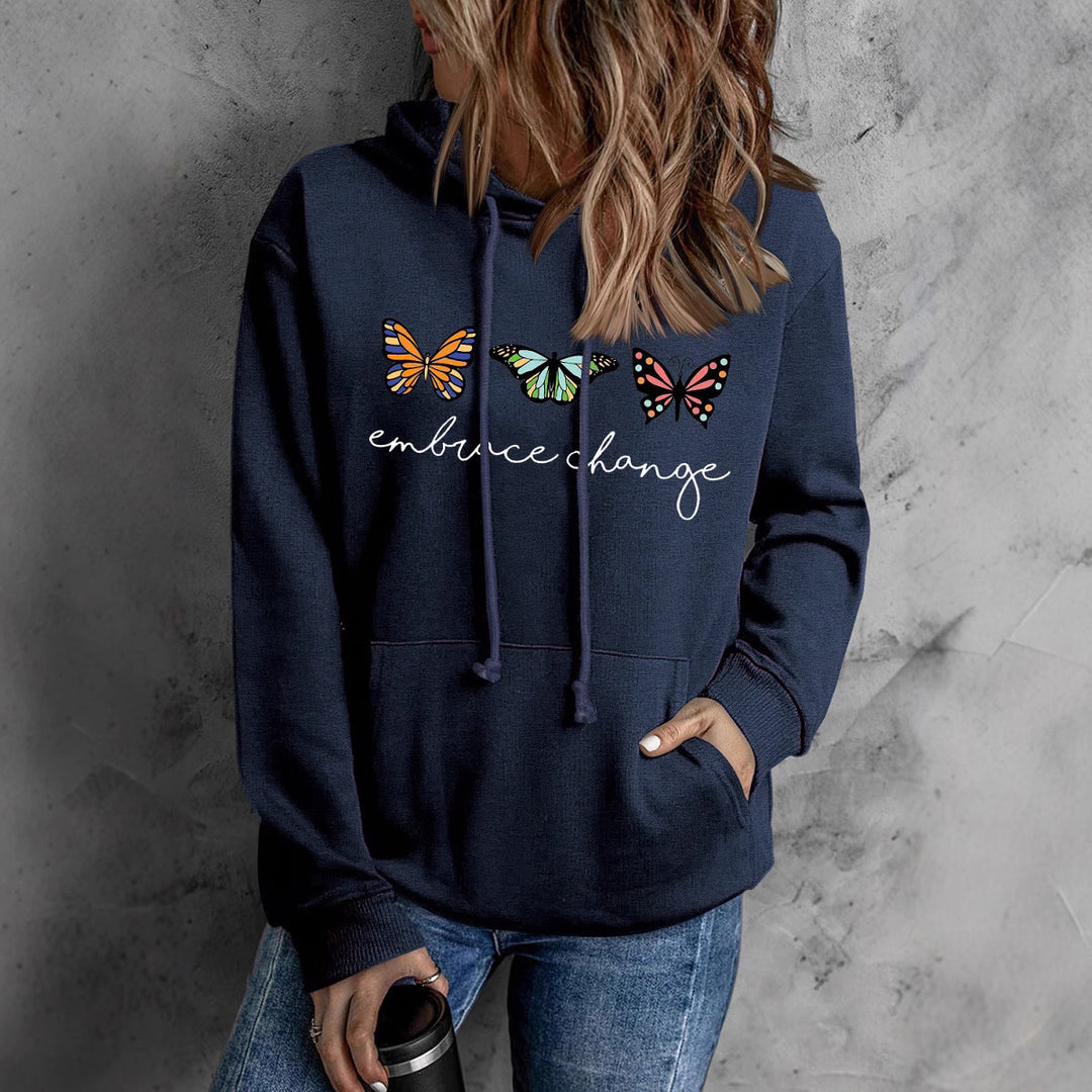 Dame hoodie med inspirerende sommerfuglmotiv og motiverende budskap Skjora