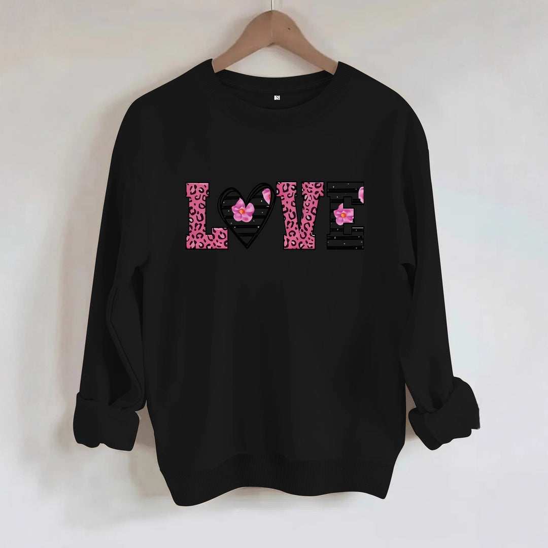 Dame sweatshirt med moderne leopard hjerte-design og behagelig passform Skjora