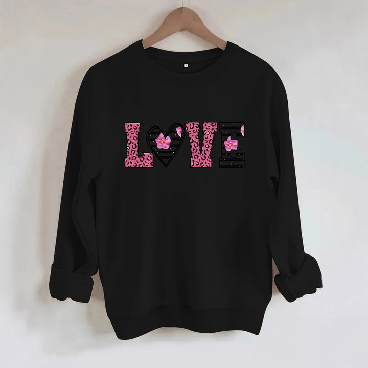Dame sweatshirt med moderne leopard hjerte-design og behagelig passform Skjora
