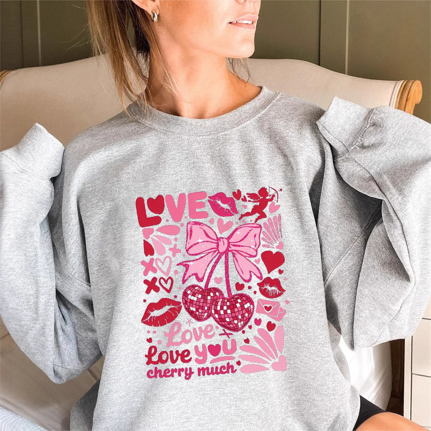 Dame sweatshirt med voluminøse ermer og lekent kirsebærmotif Skjora
