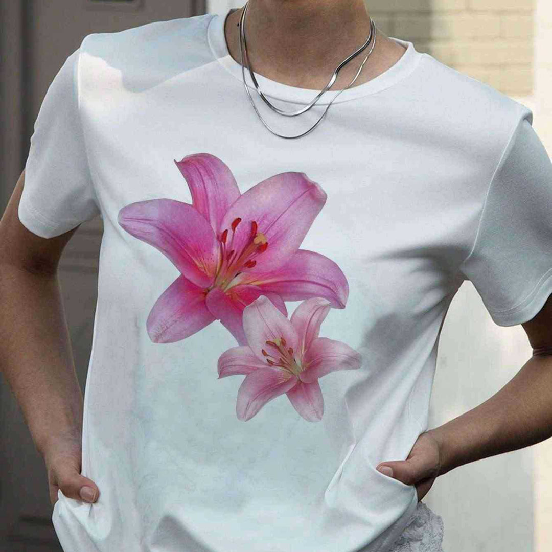 Dame T-skjorte med blomstermotiv og komfortskjæring Skjora