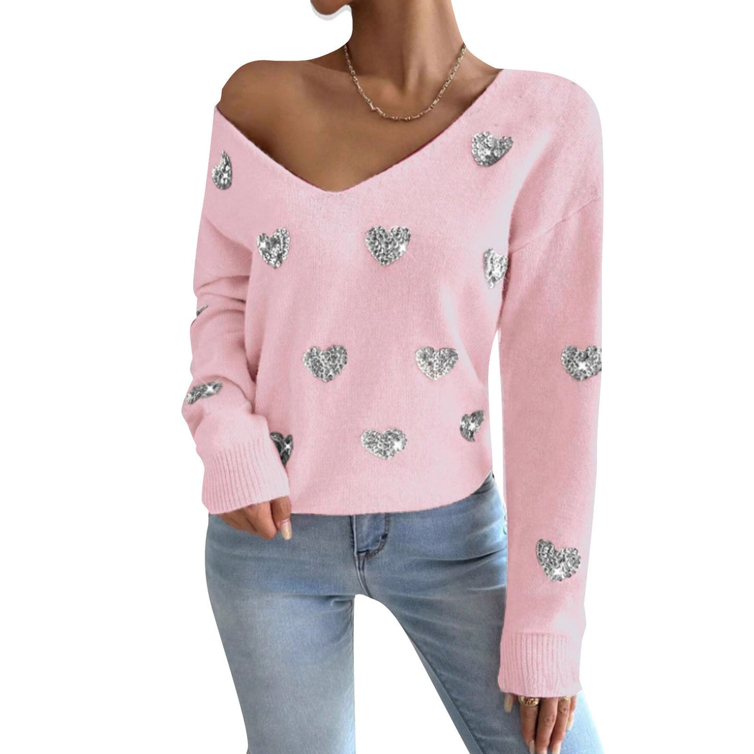 Kvinnelig oversized genser med dyp V-hals og hjerte motiver Skjora