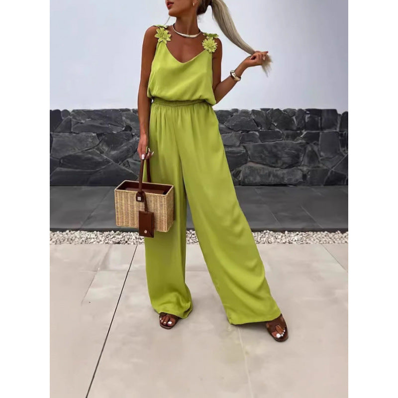 Dame jumpsuit med blomstrete volanger og vide ben Skjora
