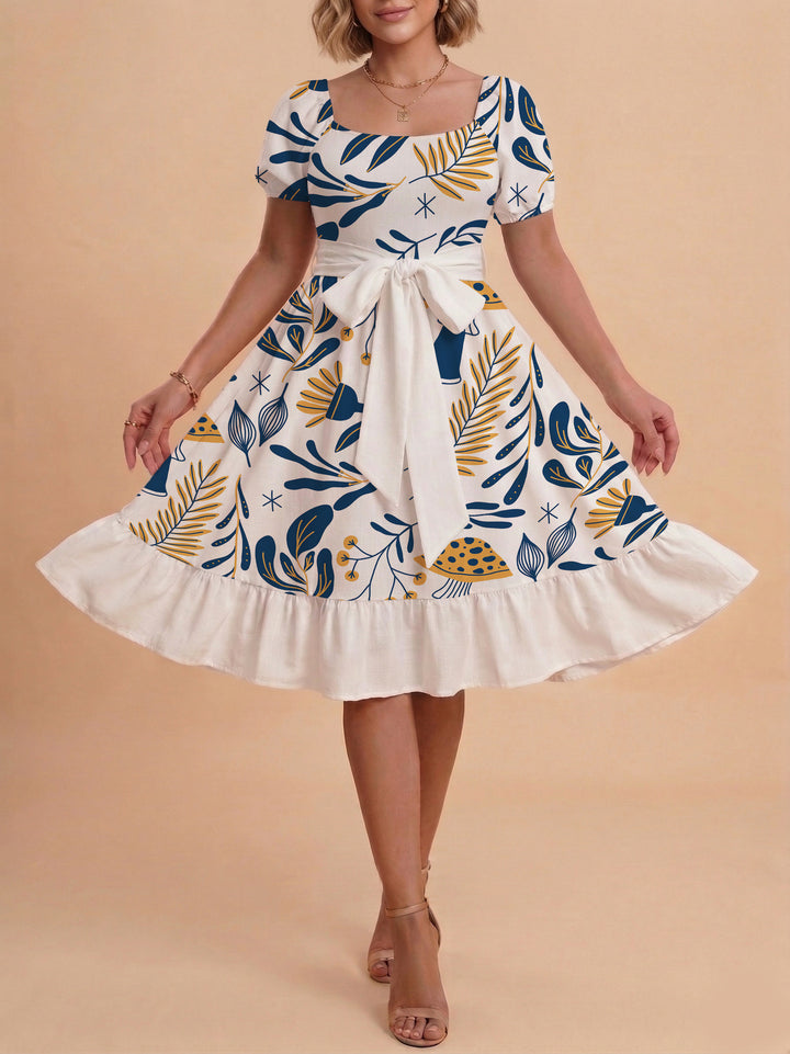 Damen Sommerliches Blumenkleid mit taillierbarem Gürtel und voluminösen Ärmeln Skjora