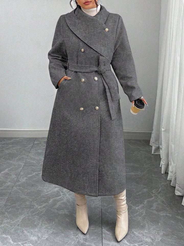 Kvinnens elegante varme ullkåpe med dobbel knappestolpe og belte Skjora