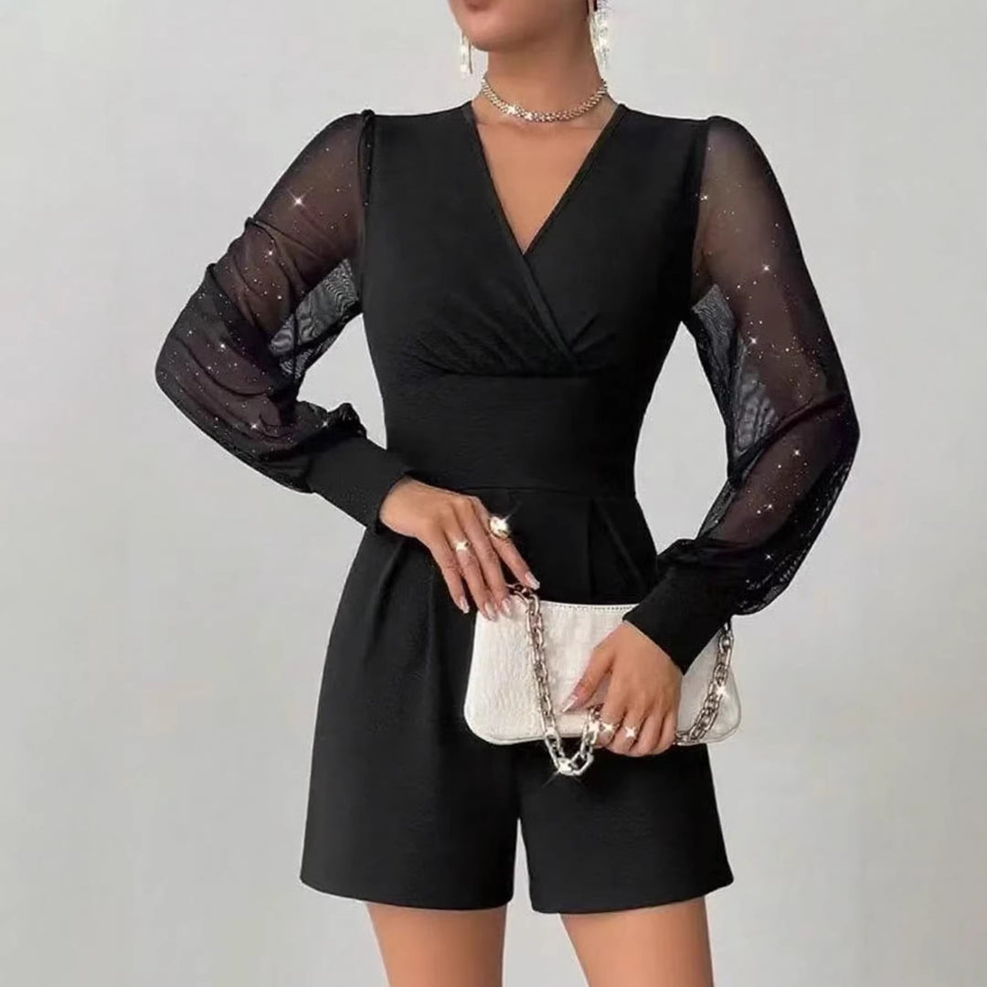 Dame elegant jumpsuit med transparente puffermer og V-hals Skjora