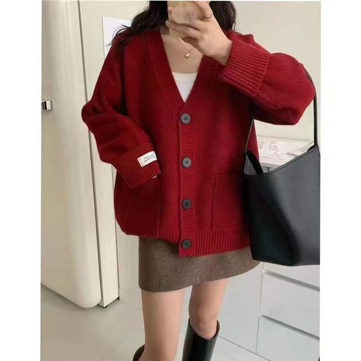 Damenes uformelle oversized cardigan med store lommer og knappdetaljer Skjora