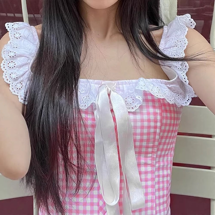 Dame blusenshirt med elegante ruffle-detaljer og satengbånd Skjora