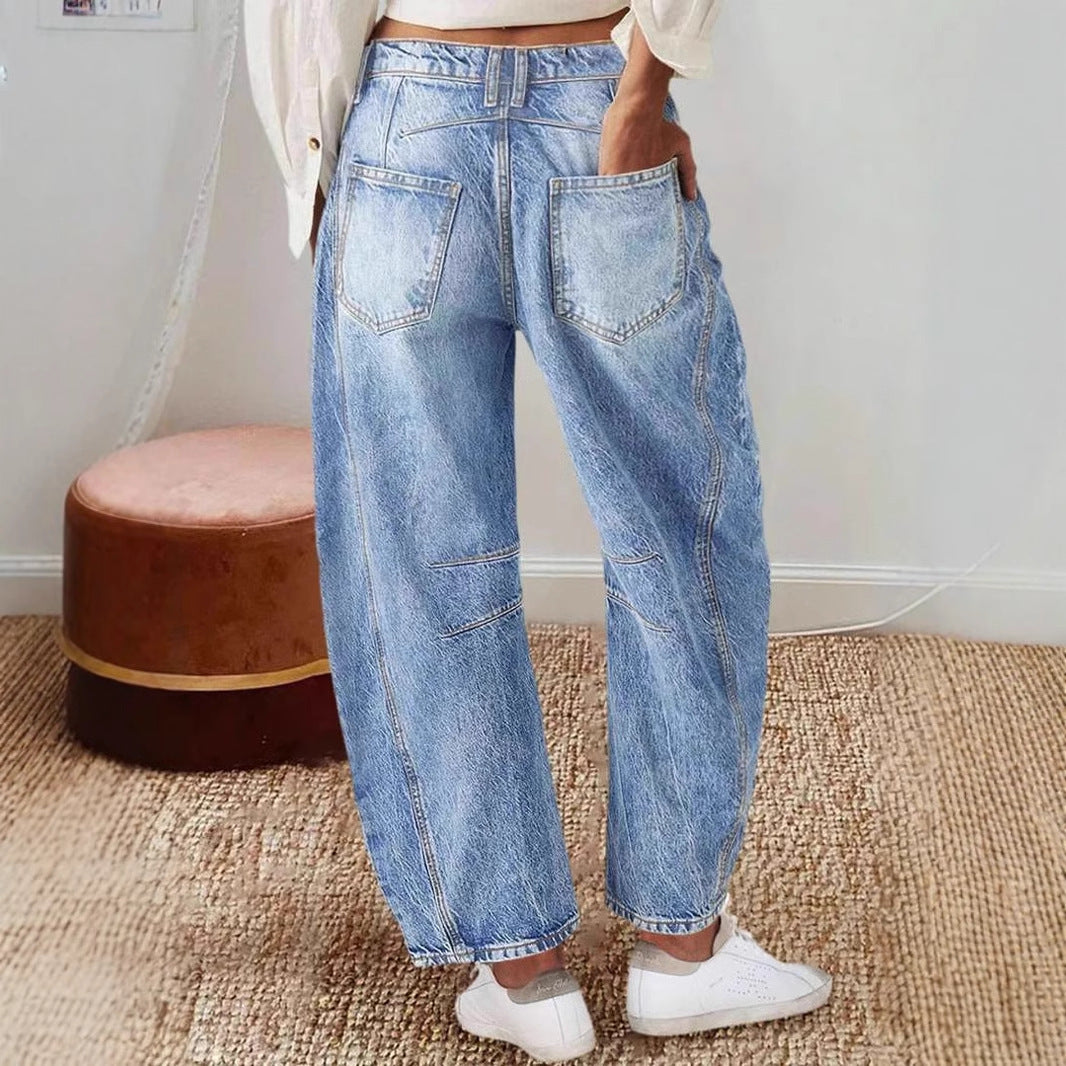 Kvinne brede denimjeans med høy midje og moderne designdetaljer Skjora