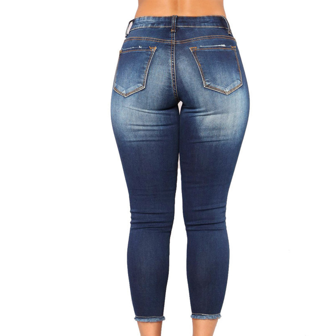 Dame jeans i avslappet brukt utseende med trendy rifter Skjora