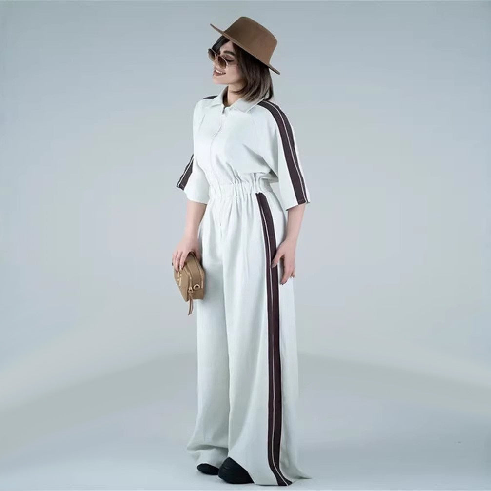 Kvinnenes lange jumpsuit med belte og kontraststriper