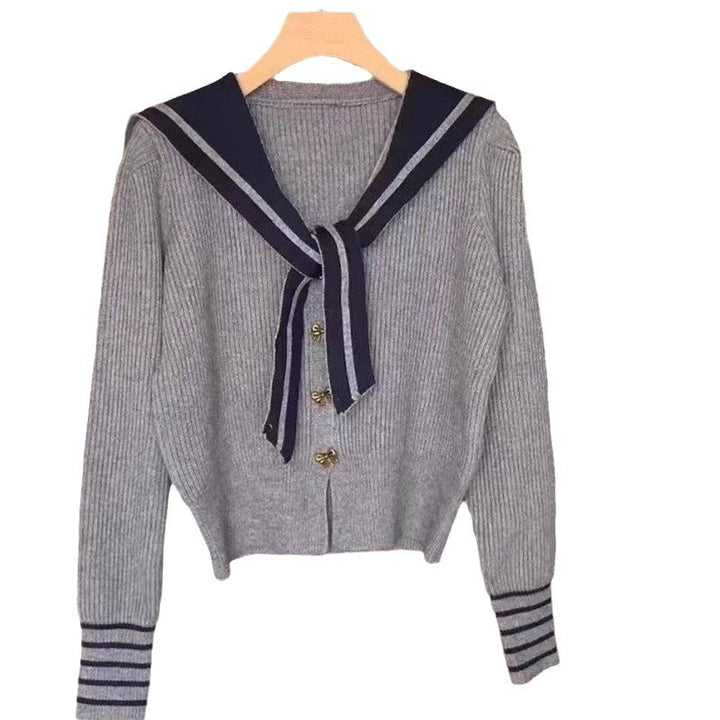 Kvinne cardigan med nautisk krage og dekorative knapper Skjora