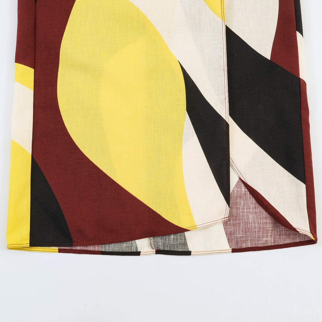 Dame Maxiskjørt med fargerikt grafisk design og elegant drapering Skjora