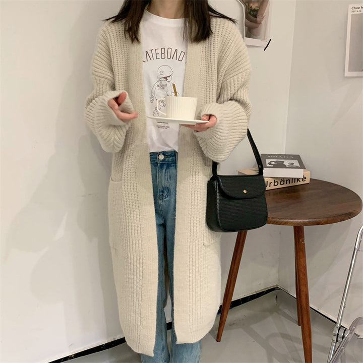 Kvinnes Plus Size Strikket Cardigan med Casual Snitt og Lommer Skjora