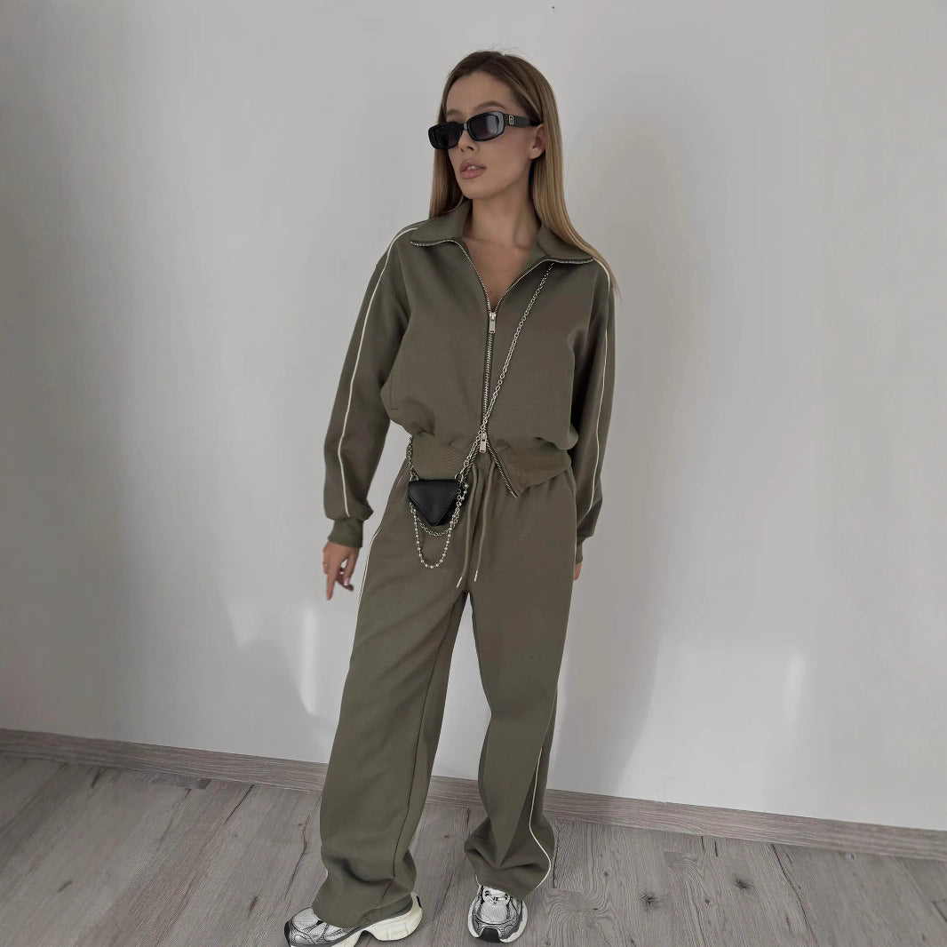 Kvinnelig sporty sett med trendy glidelås og slim fit Skjora