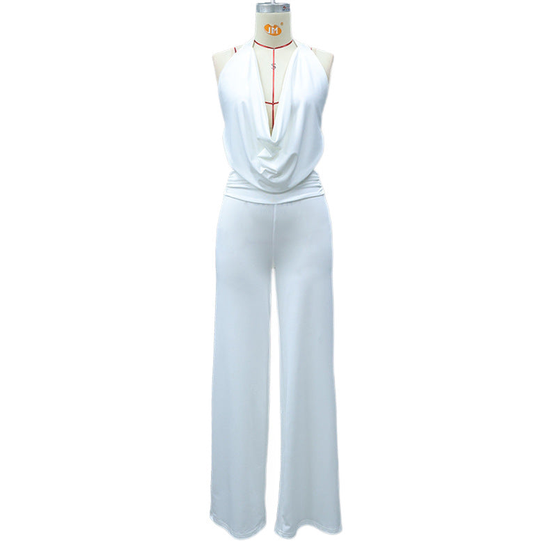Dame jumpsuit med elegant innpakningsdetalj og vide benpartier Skjora