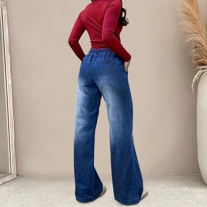 Kvinners vidde jeans med elastisk midje og trendy brukt utseende