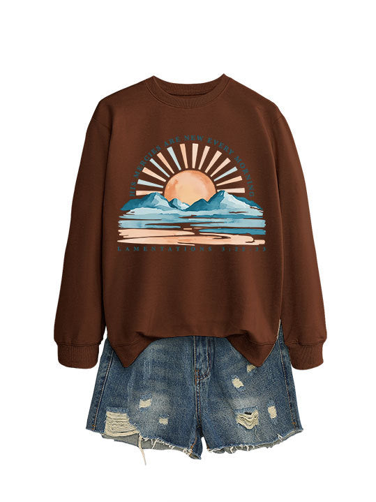 Kvinne sweatshirt med inspirerende soloppgang design og avslappet passform Skjora
