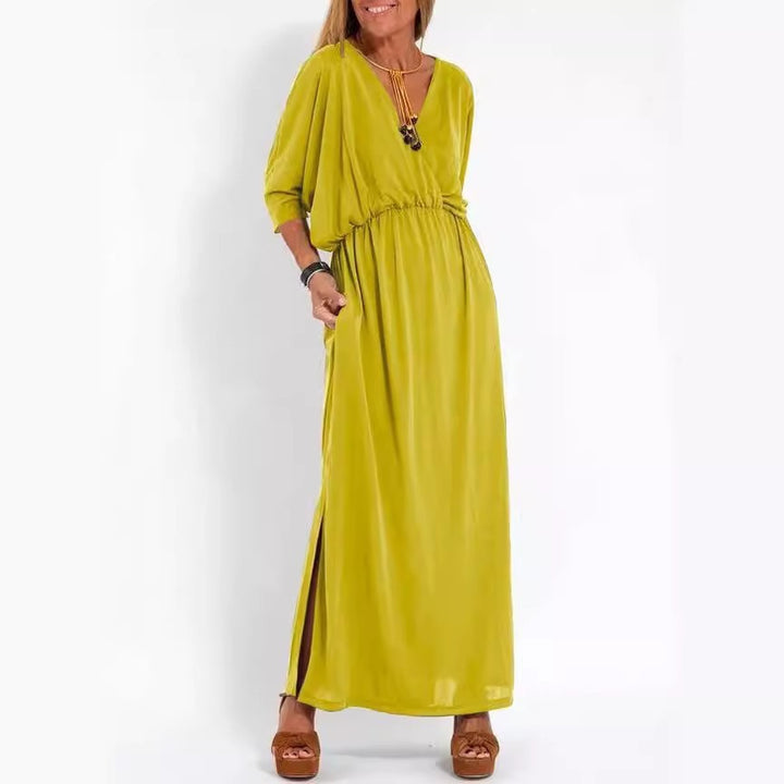 Kvinne elegant maxi kjole med sidesplit og fleksibel midje Skjora